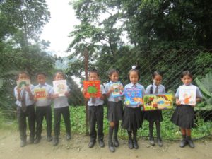 Emily kids with books