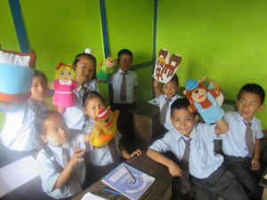 Emily kids with puppets